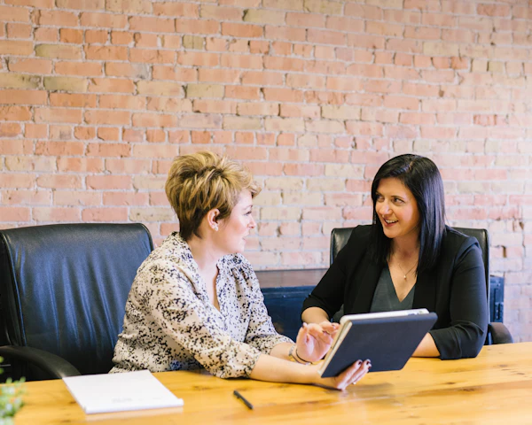 Legal professionals reviewing work together
